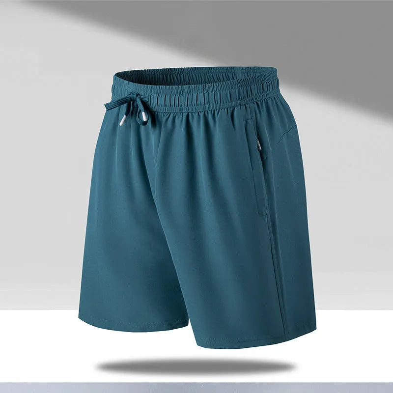 Men's loose fit quick-drying sports shorts in polyester fabric for summer activities