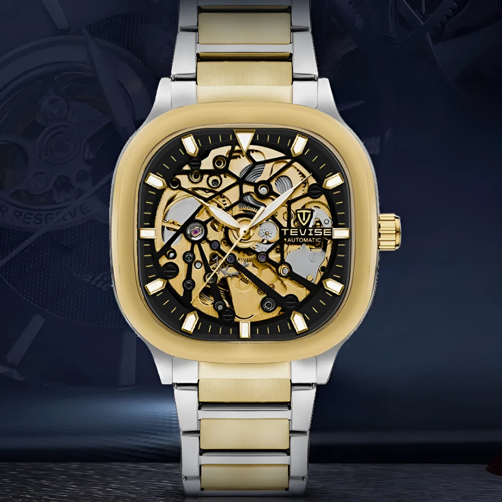 Men's square automatic watch with luminous hollow dial on a stainless steel strap, shown in blue colour.