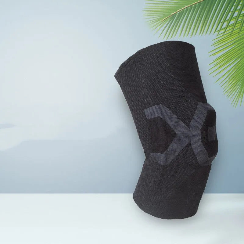 A pair of men's silicone knee pads for sports protection shown in a two-tone colour.