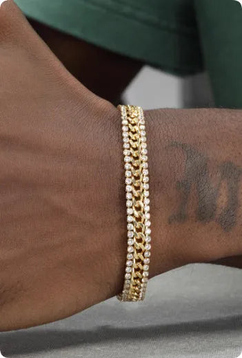 Gold tennis bracelet with artificial gemstone details on titanium steel band