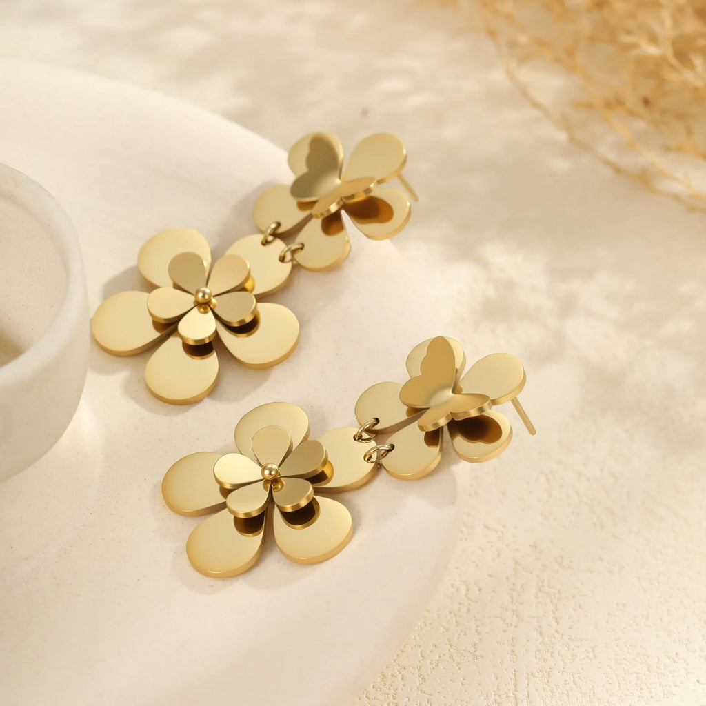 Gold electroplated stainless steel earrings with flower and butterfly designs for women