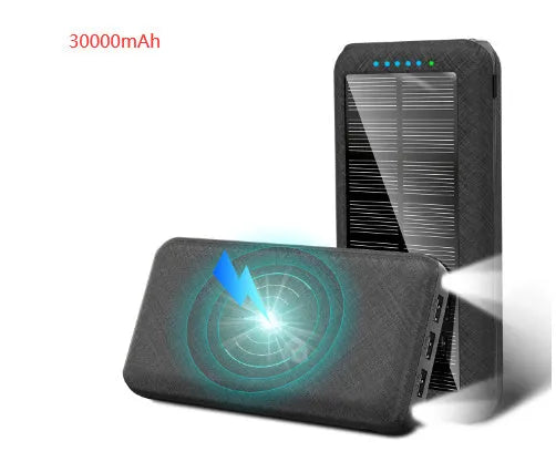 Black wireless solar power bank with Qi charging pad, three USB ports and an LED flashlight