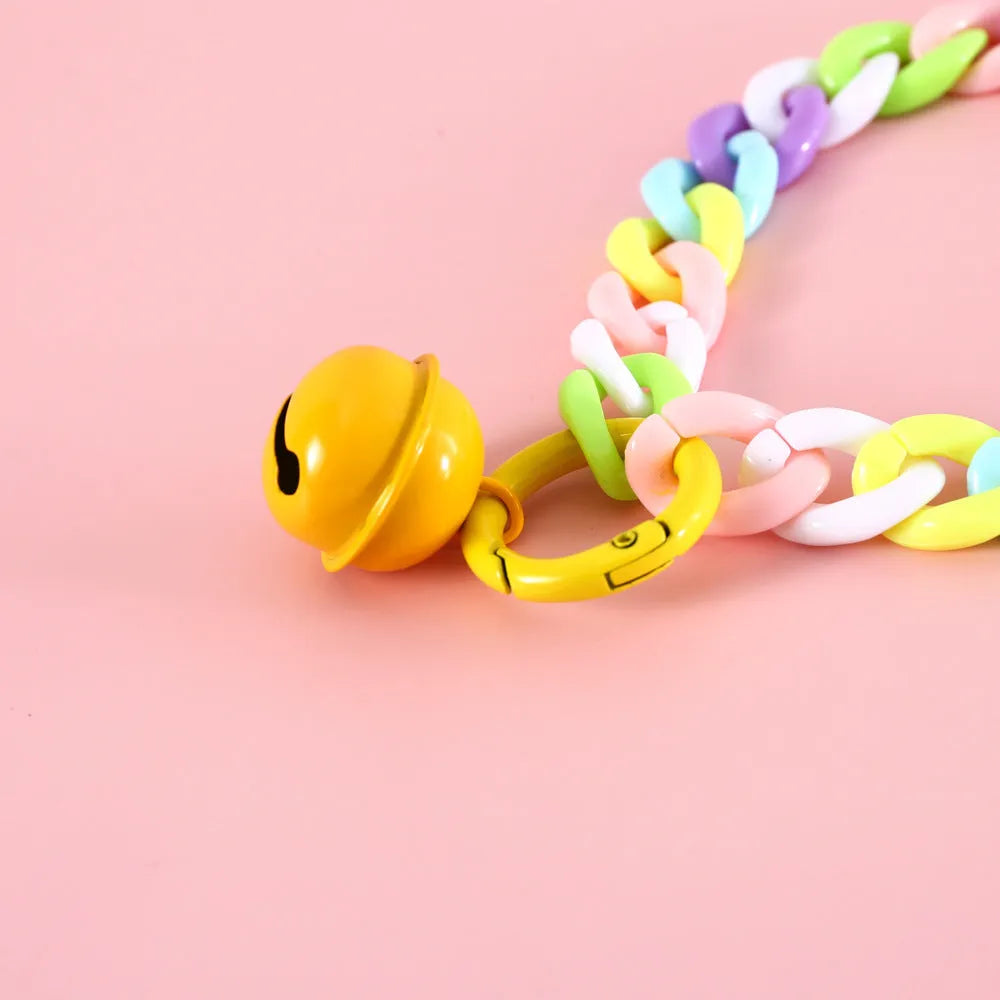 Plastic monochrome chain pet collar shown in chain blue, pink, and mixed colours for S and M sizes.