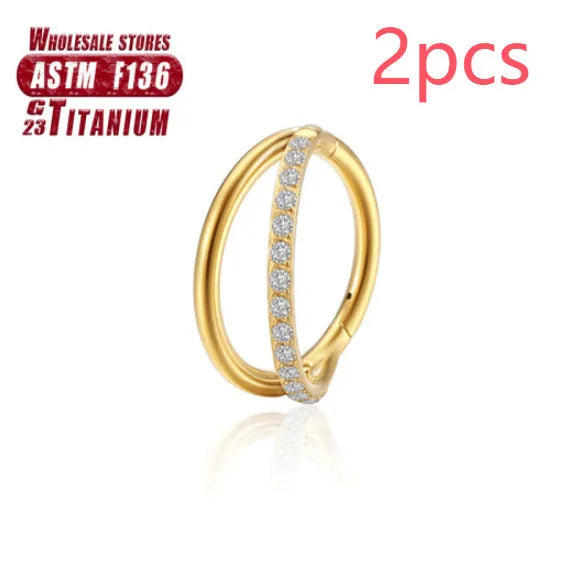 Titanium alloy nose ring in silver, available in plain or diamond-set styles and multiple lengths.