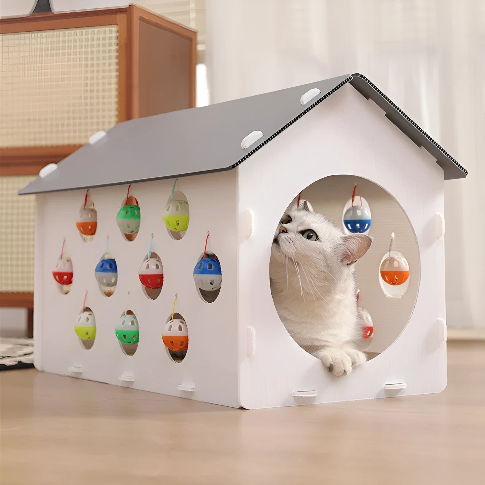 Plastic cat scratch board nest with hanging bell ball toy and tunnel passage