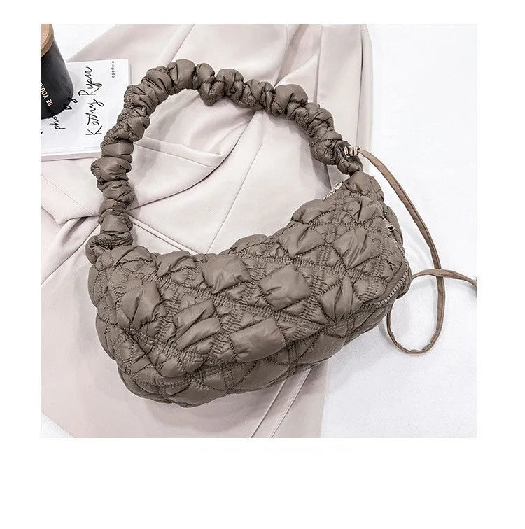 Women's nylon shoulder messenger bag in beige colour showing adjustable strap and dimensions