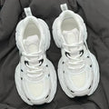 Beige platform mesh shoes with wedge heel and front lace-up design on rubber sole