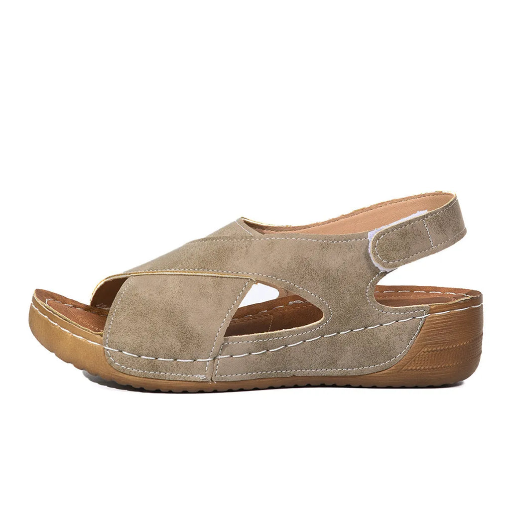 Roman platform sandals with decorative skirt and velcro closure in earth-tone colour