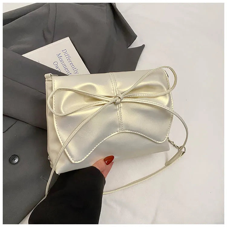 Women's large capacity horizontal square underarm bag in PU material with sewing line details and multiple colour options