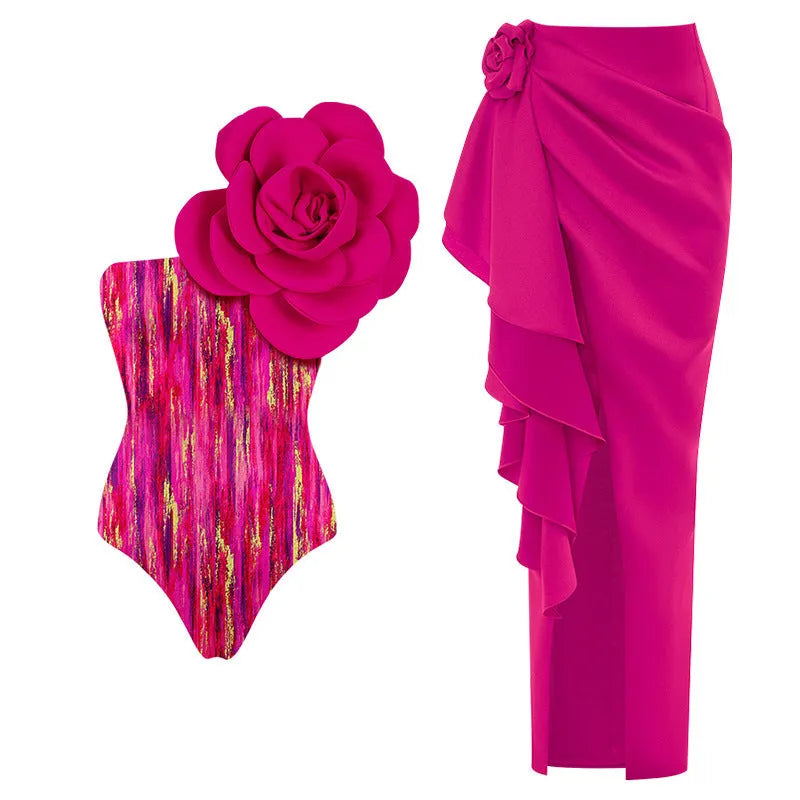 Close-up of a solid colour one-piece swimsuit with raised three-dimensional flower pattern detail