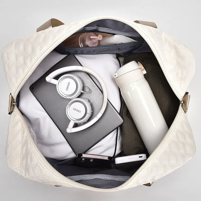 Oxford cloth portable large capacity travel bag in solid colour with 36-55L storage capacity