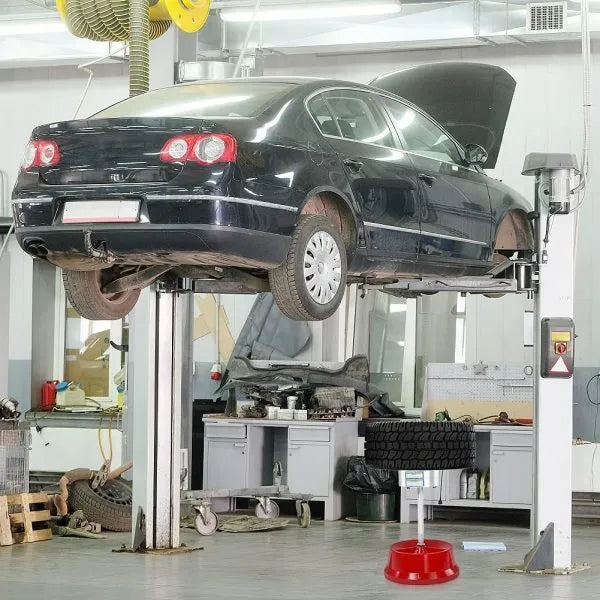 Portable hub wheel balancer with aluminium head and bull's eye level on enamel base