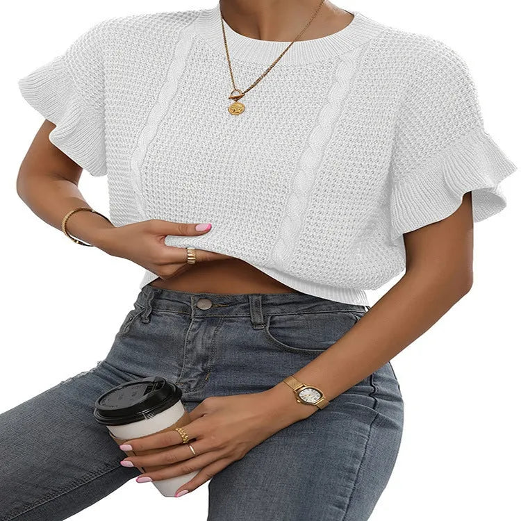 White knitted pullover sweater with 3D twisted string pattern and ruffled short sleeves on a hanger.