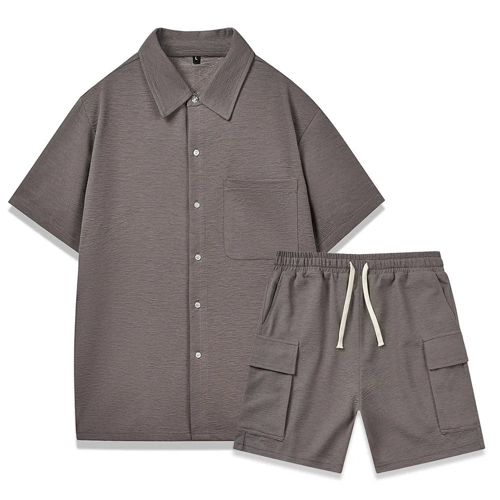 Women's beige elastic waist shorts and short sleeve top two-piece casual set laid flat.