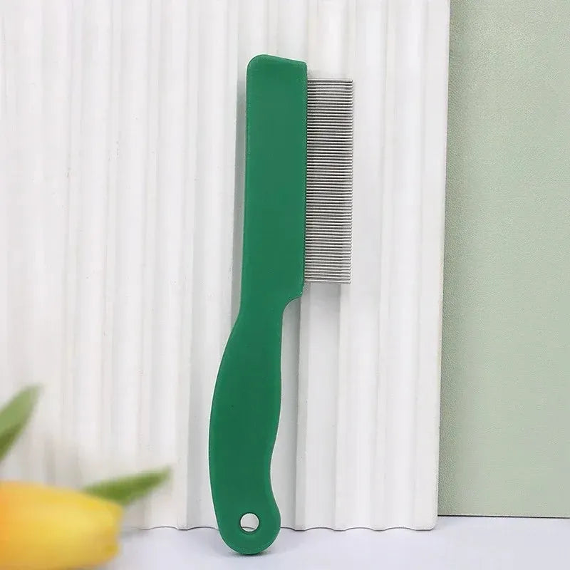 Green plastic handle stainless steel pin flea comb for dogs and cats on a white background.