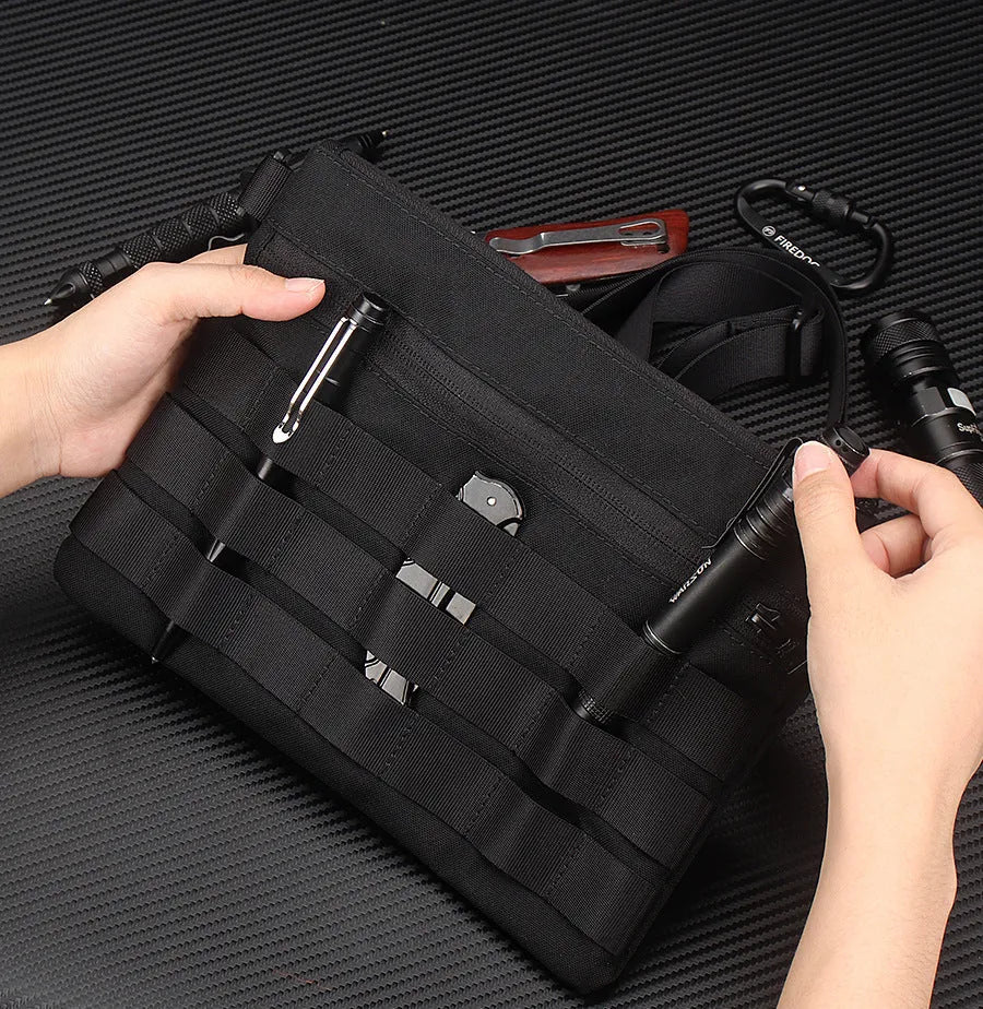 Black solid colour oxford cloth portable outdoor organiser bag with 18cm by 3.5cm dimensions.