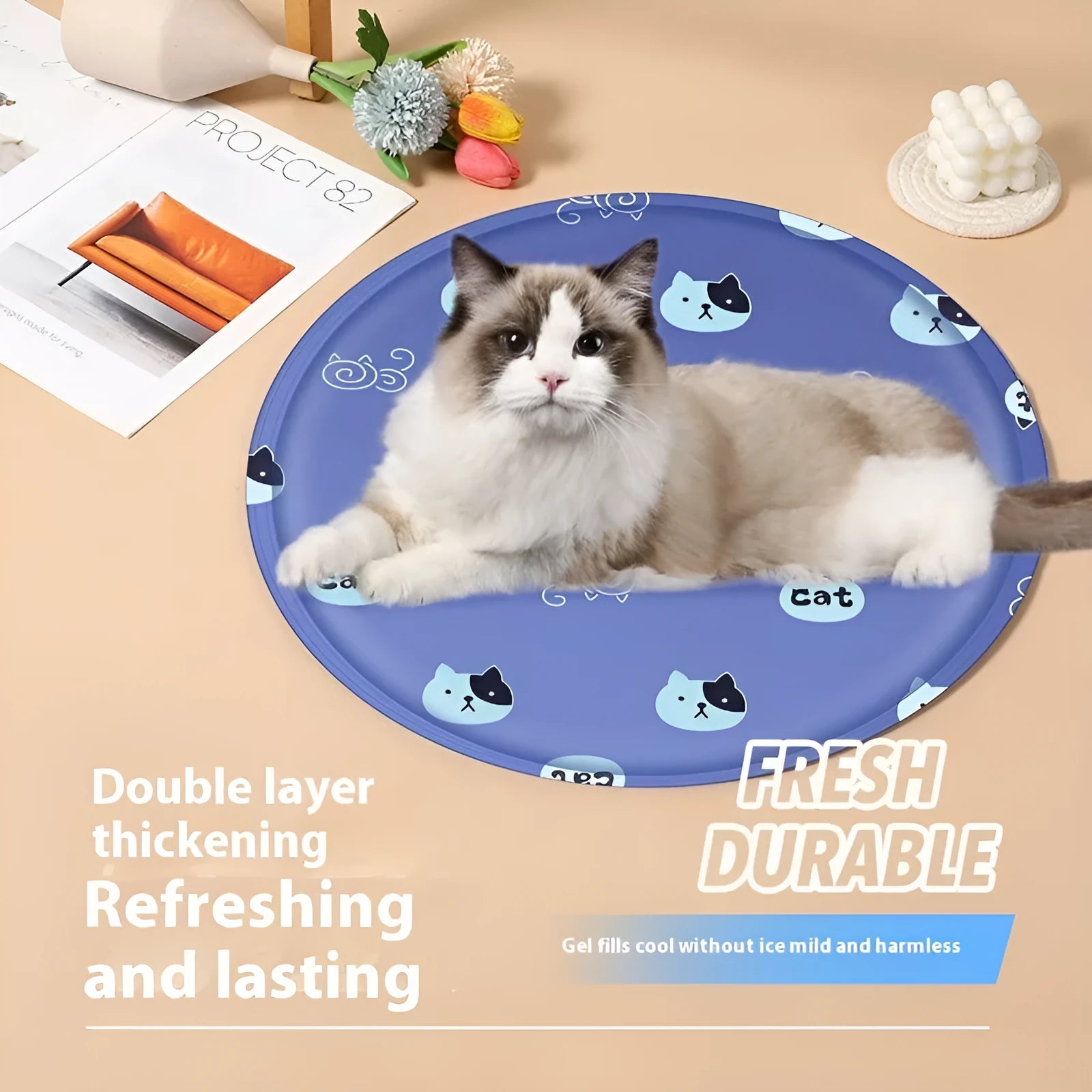 Round gel cooling mat for dogs in blue paw print cartoon design on a beige background