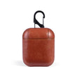 Genuine leather charging case for Apple Airpods in black, brown, light brown, and red