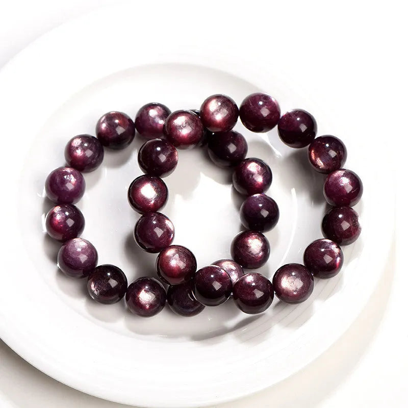 Natural purple lepidolite crystal round beads bracelet with geometric shapes and polished surfaces