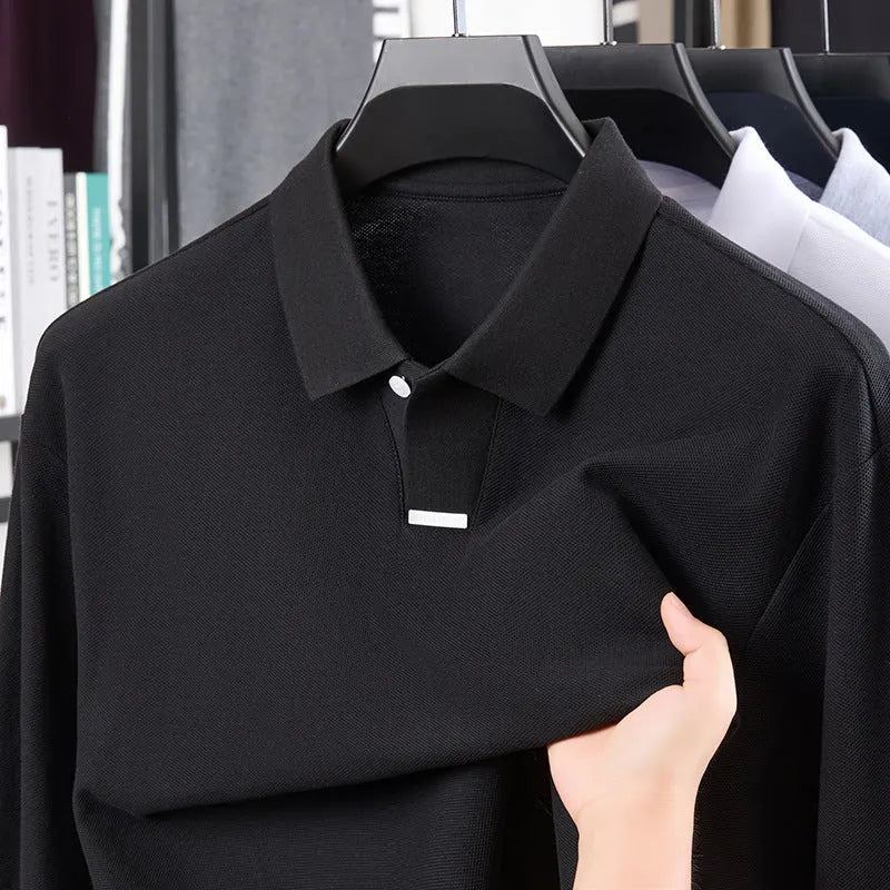 Men's grey loose fit cotton polo shirt with lapel collar and long sleeves on a hanger