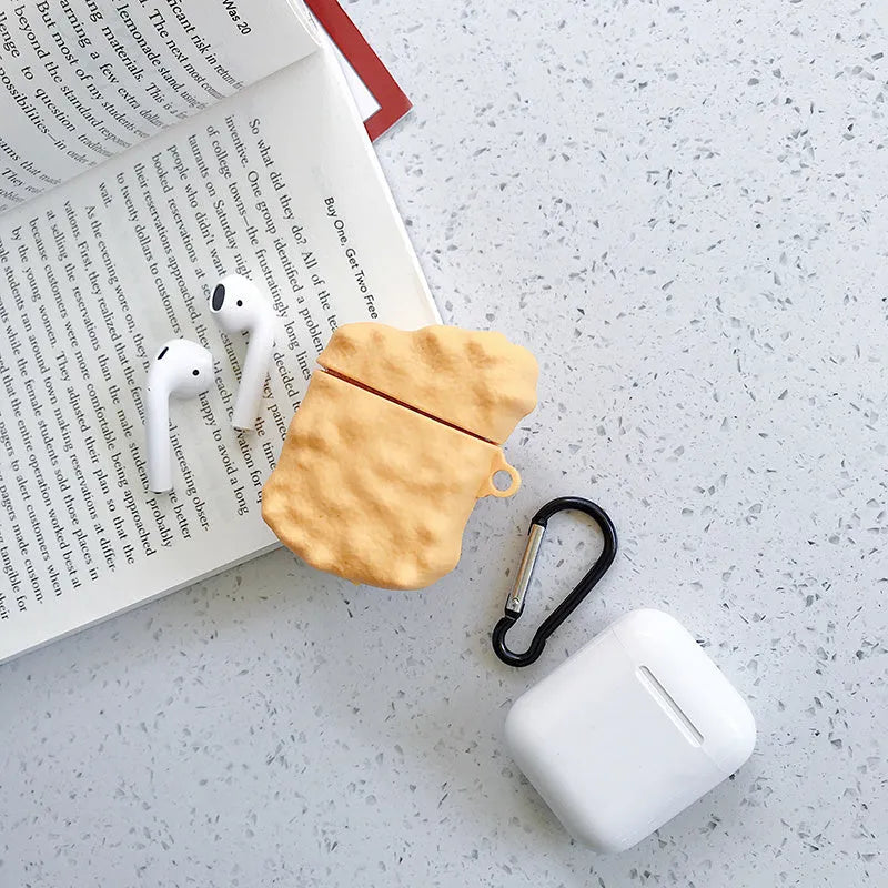 Green silicone case for AirPods 1/2 with a cartoon animal design on a white background.
