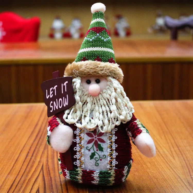 Red, green, and white flannel Christmas snowman decoration measuring 18 by 13 cm