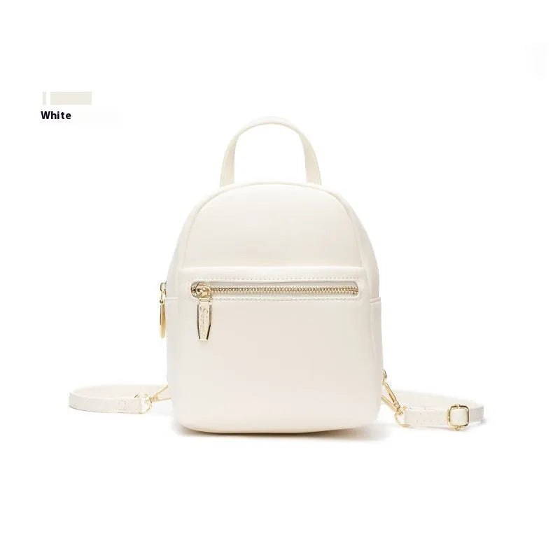Soft PU mini backpack in street style with three-dimensional pocket and contrast trim
