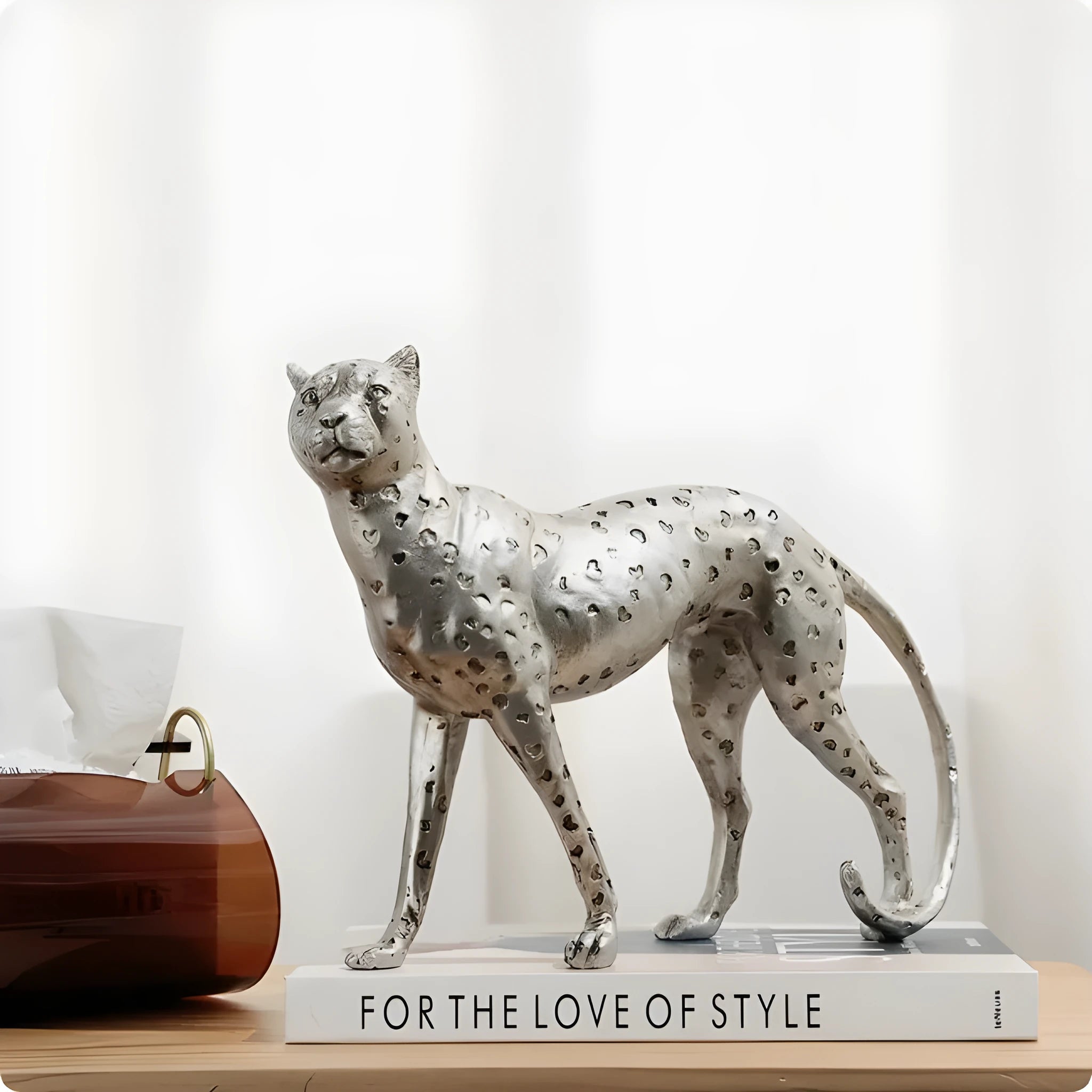 Modern leopard figurine resin ornament on a shelf