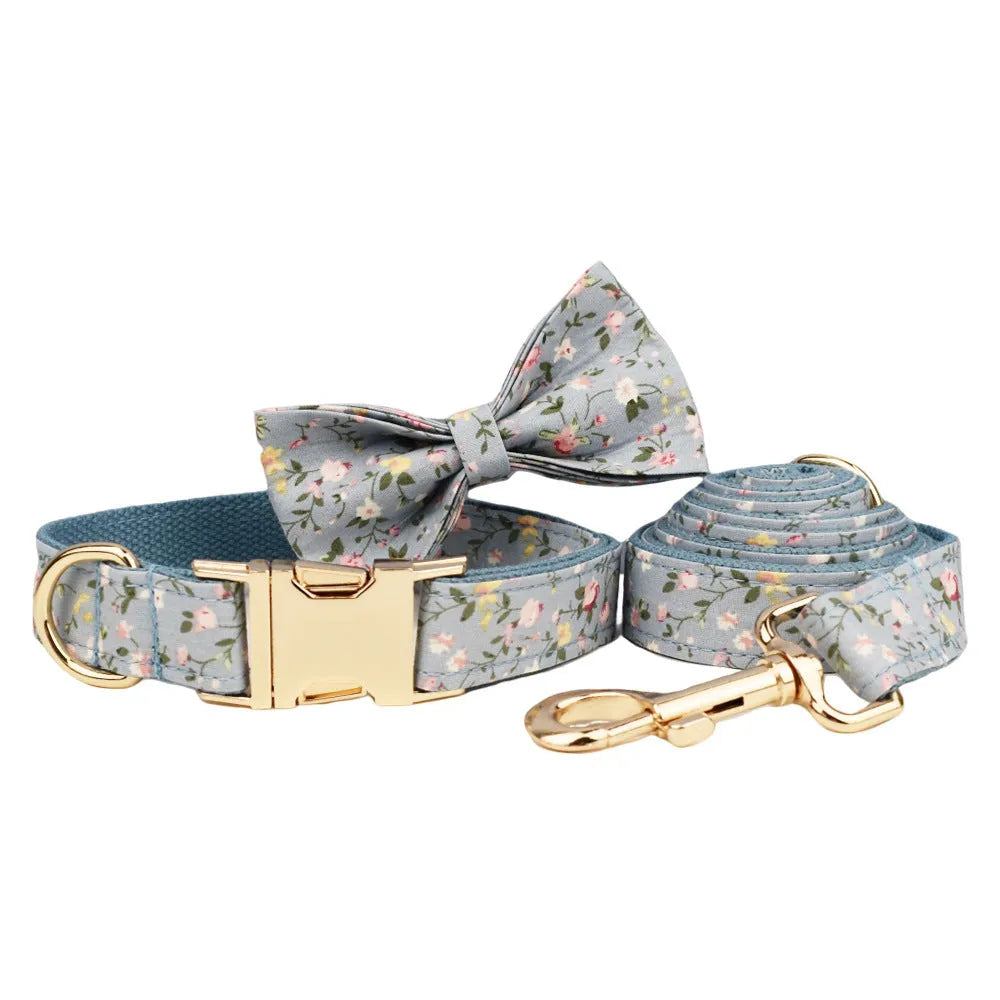 Blue floral polyester cotton dog collar set with leash, vest, bow, and poop bag in sizes XS to XL