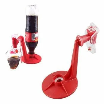 Red plastic Magic Tap soda dispenser attached to an inverted 2-litre bottle for serving fizzy drinks