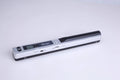 Handheld plastic scanner in multiple colours including black, blue, green, red, and silver with a USB cable.