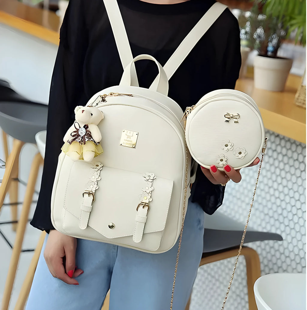 Women's 3-piece leather bag set with floral designs including backpack, shoulder bag and card wallet