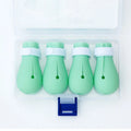 Four green silicone cat anti-scratch foot covers for paw protection during washing and medical care