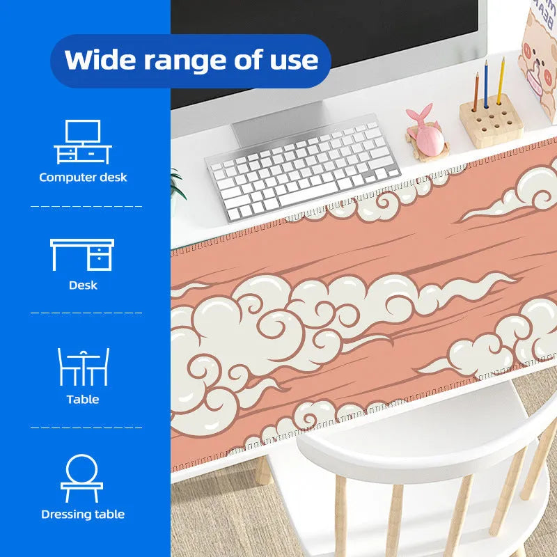 Large cloud pattern desk mat with non-slip rubber base on a wooden table.