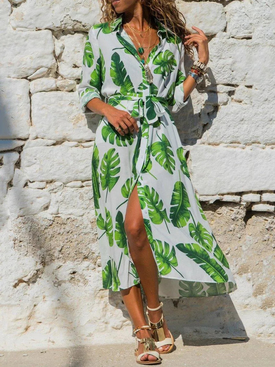 Women's V-neck chiffon dress with high waist and A-line skirt in a printed pattern.