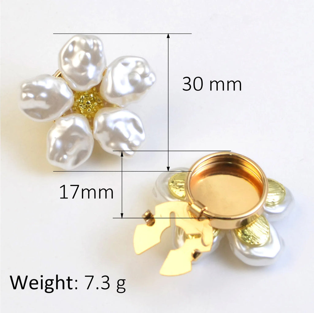 White alloy pearl rhinestone cufflink with electroplated finish and inlaid diamond setting on solid background