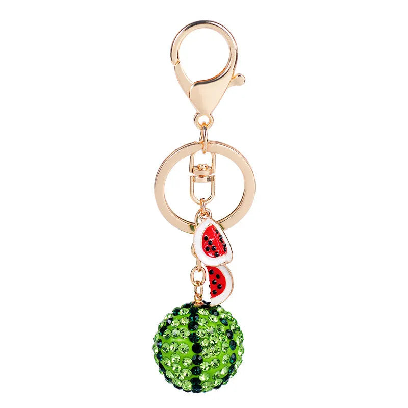 Green watermelon shaped zinc alloy keychain measuring 12cm