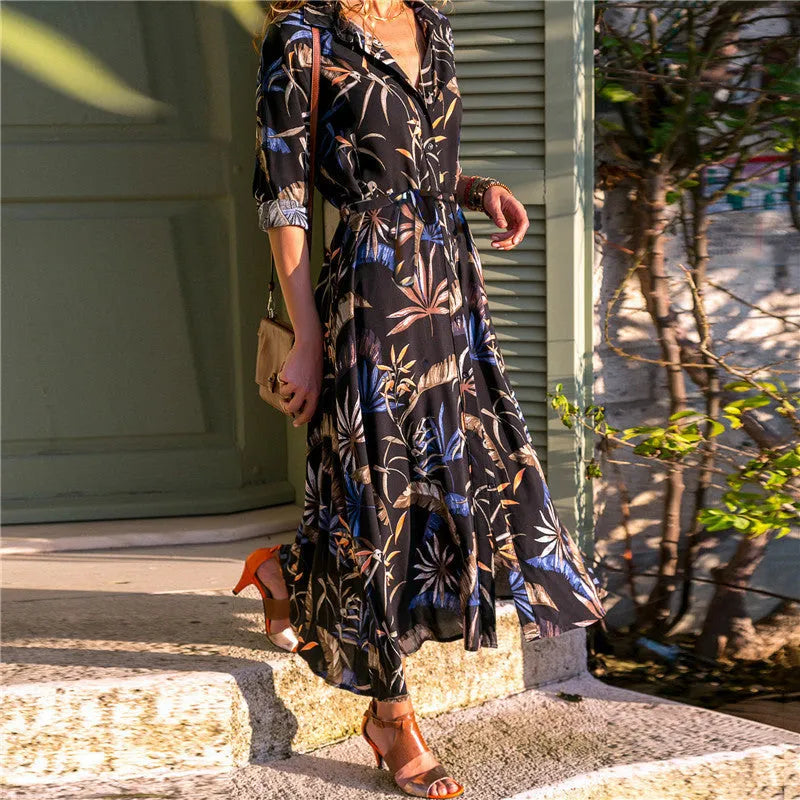 Women's V-neck chiffon dress with high waist and A-line skirt in a printed pattern.