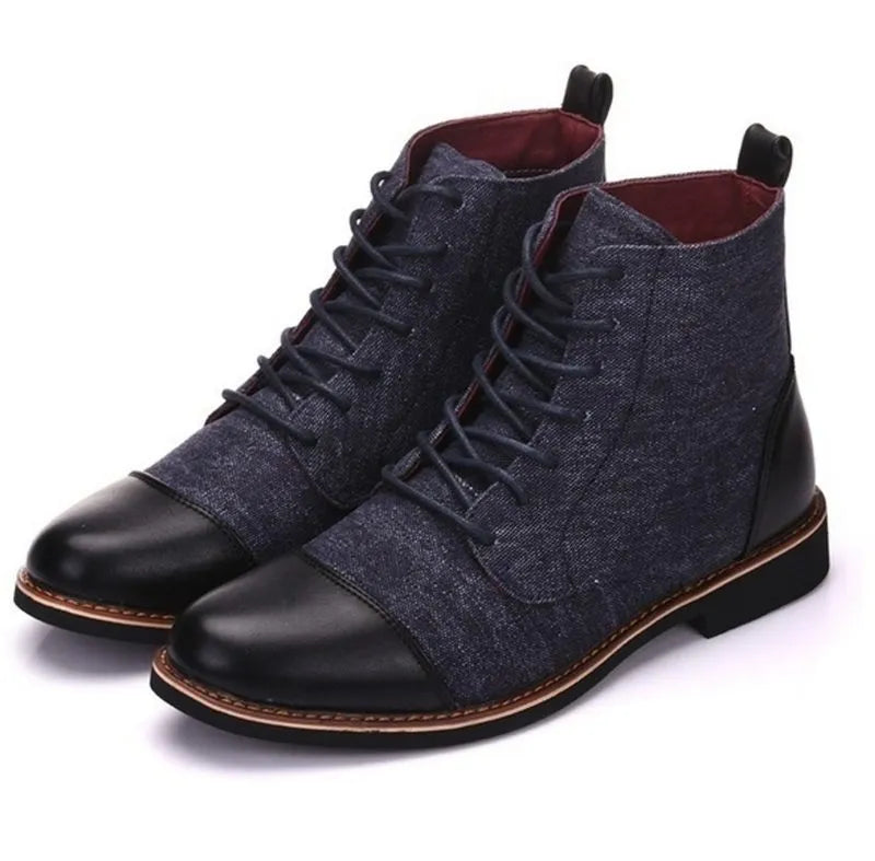 Men's black leather motorcycle-style boots with silver belt buckles on the side, featuring a thick rubber sole.