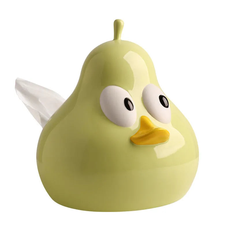 White ceramic pear-shaped tissue box in green or black colour on desktop