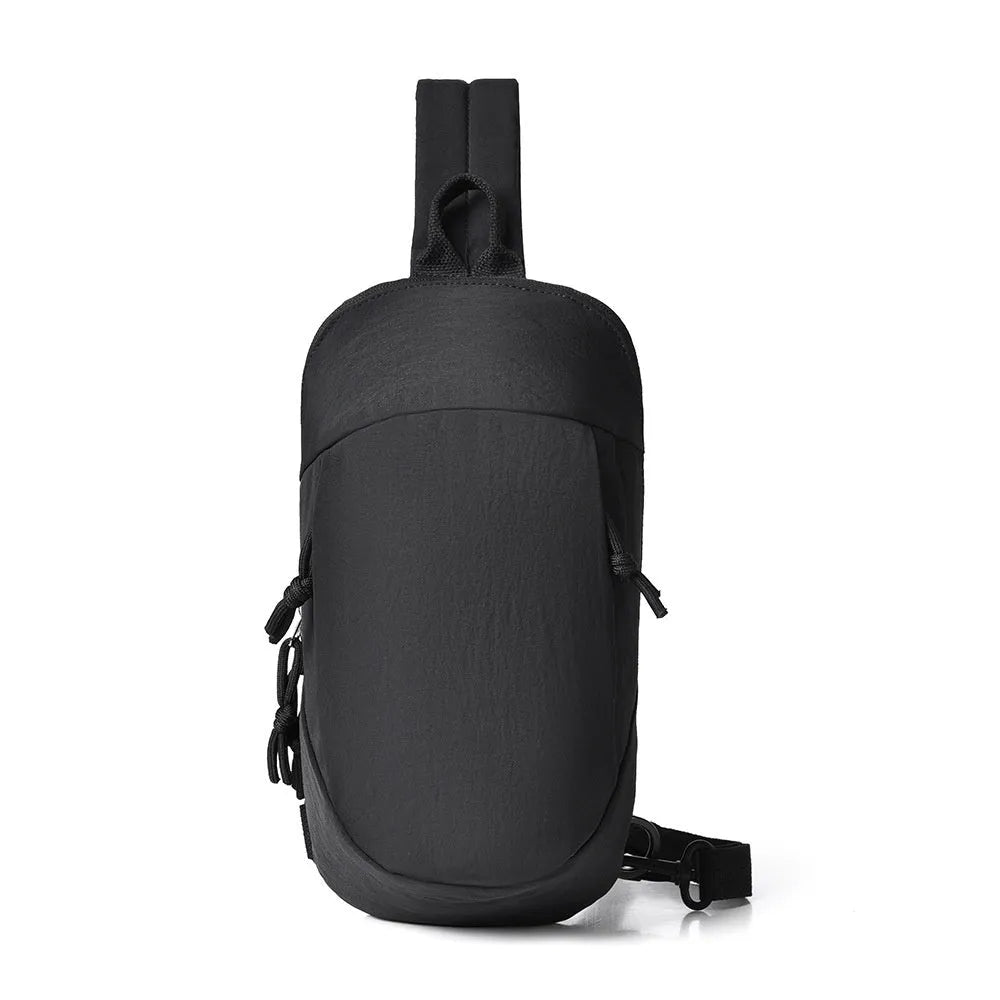 Girls outdoor crossbody bag in nylon, shown in Army Green colour with a single shoulder strap.