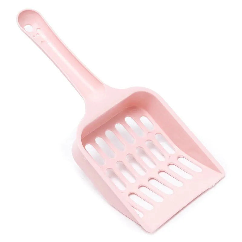 Blue plastic cat litter scoop on a white background
