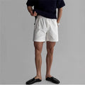 Cotton loose fit sports shorts in black, white or khaki colours for summer sports activities