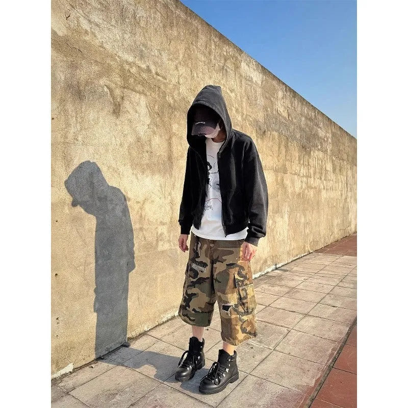 Men's camouflage cropped jeans with retro patches and ripped detailing in straight leg cut