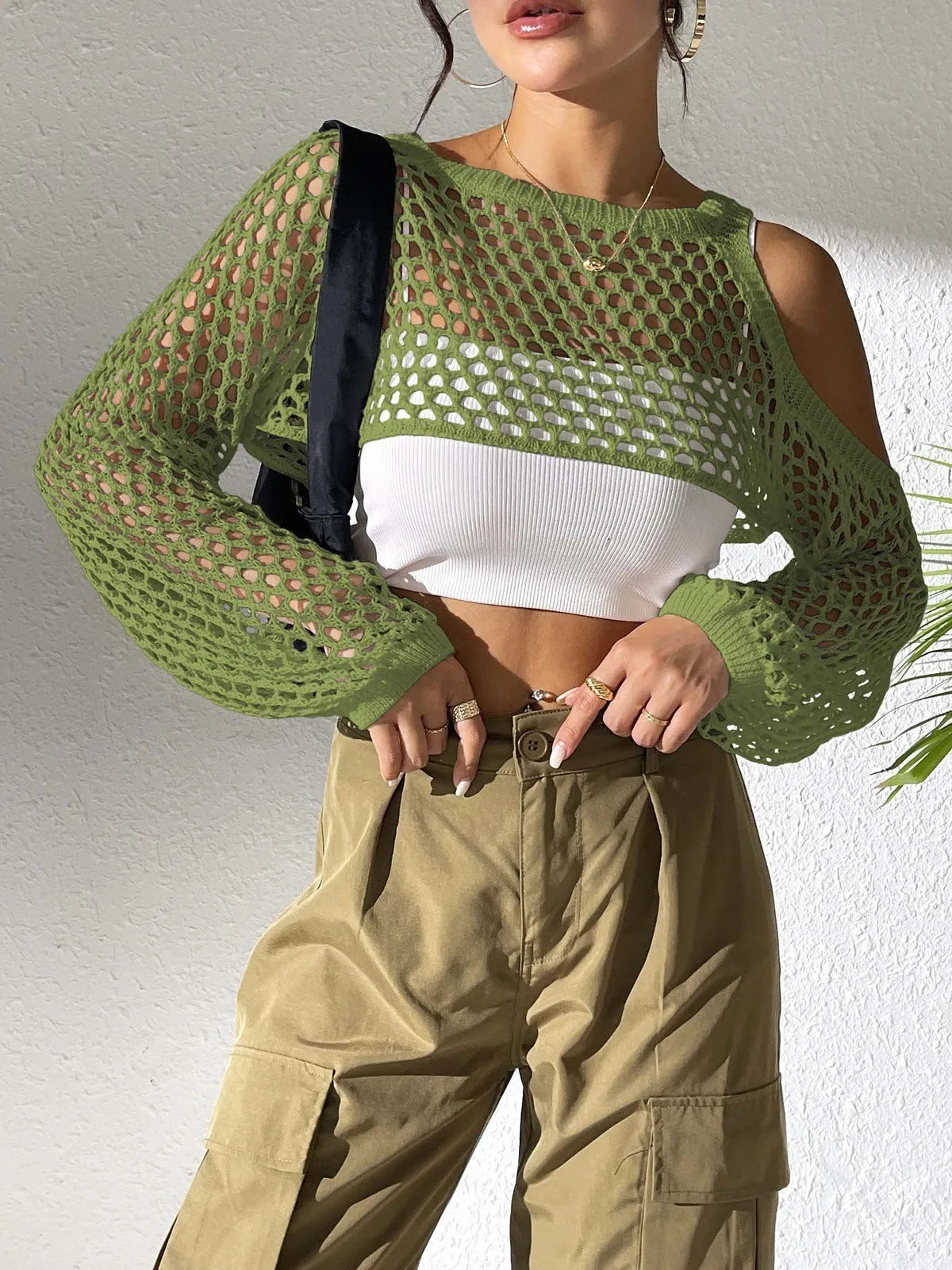 Mesh shirt with a navel cutout design in a free size, shown in one of six available colours.