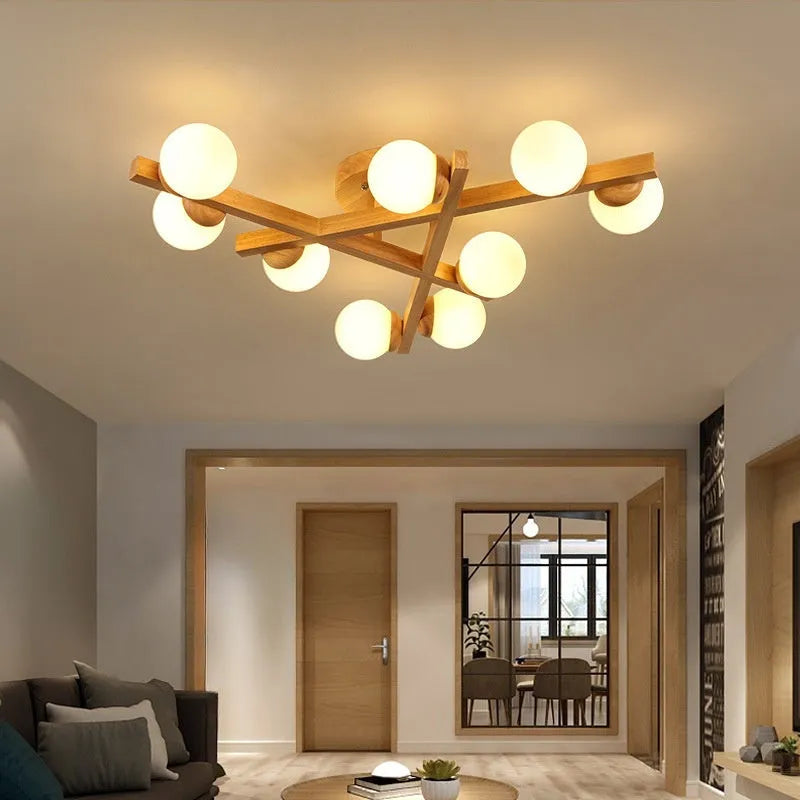 Wooden style modern ceiling light with three neutral light heads in Nordic design