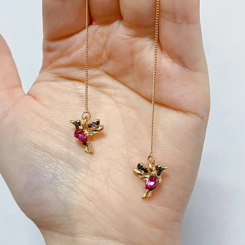 Bird hanging earrings with mixed zirconium wings in long style design on alloy background