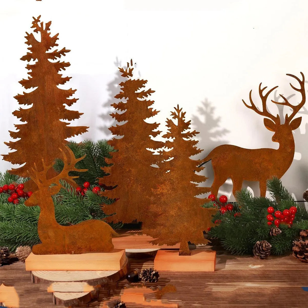 Set of three rustic metal Christmas tree ornaments featuring elk designs in weathered iron finish.