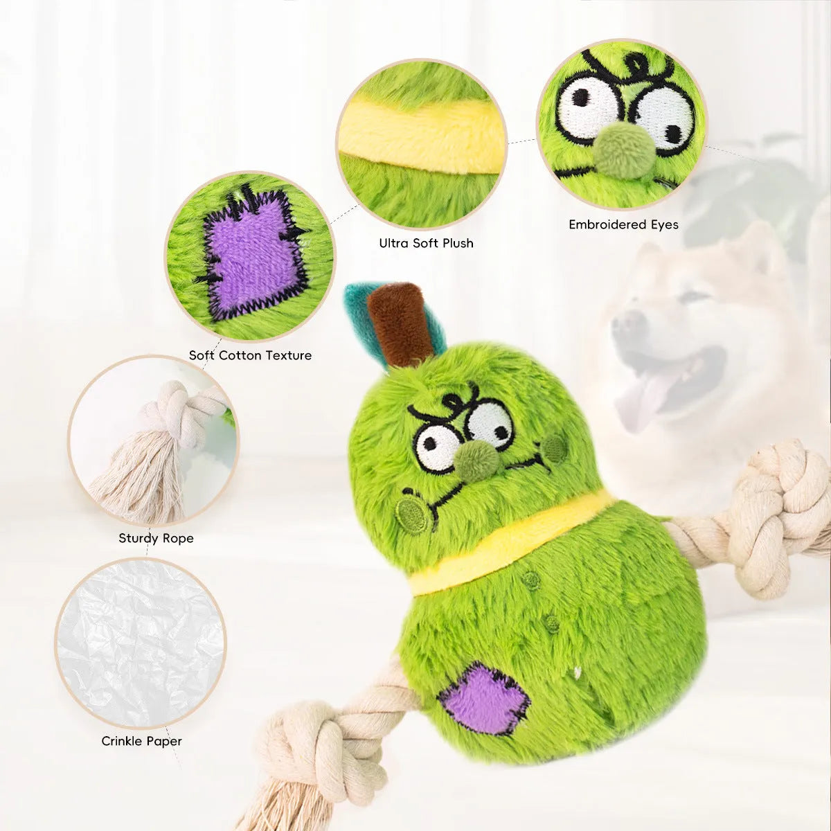 Green and purple interactive dog toy with plush centre and knotted rope tug-of-war arms