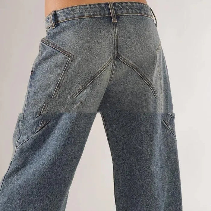 Women's loose fit cotton wide leg mop trousers in blue, showing low waist and straight leg design.